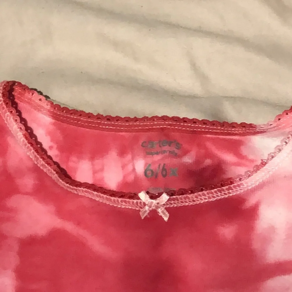 Girl’s pink hand dyed shirt. Marked size 6